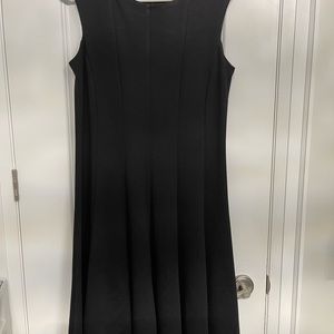 Sleeve less black dress.
